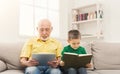 Senior man using digital tablet at home Royalty Free Stock Photo