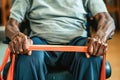 Senior man using resistance stretch bands for strength training in gym. Royalty Free Stock Photo