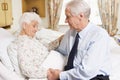 Senior Man Visiting His Wife In Hospital Royalty Free Stock Photo