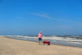 Senior man walking with dog at beach Royalty Free Stock Photo
