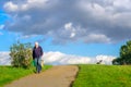 A senior man walking down from Parliament Hill in Hampstead Heath, London Royalty Free Stock Photo