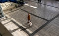 Senior man walking on train station hall Royalty Free Stock Photo