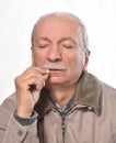 Senior man wants to take a pill Royalty Free Stock Photo