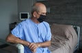 Senior man wearing face mask during corona virus and flu outbreak Royalty Free Stock Photo