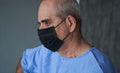 Senior man wearing face mask during corona virus and flu outbreak Royalty Free Stock Photo