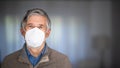 Senior man wearing  a facemask during coronavirus and flu outbreak Royalty Free Stock Photo