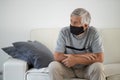 Senior man wearing  a facemask during coronavirus and flu outbreak. Royalty Free Stock Photo