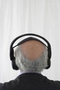 Senior Man Wearing Headphones Royalty Free Stock Photo