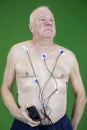 Senior man wearing heart monitor