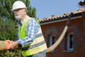 senior man working with construction pipes Royalty Free Stock Photo