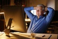 Senior man working late night Royalty Free Stock Photo