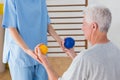 Senior man working out with his therapist Royalty Free Stock Photo