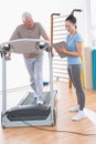 Senior man working out with his trainer Royalty Free Stock Photo