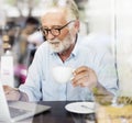 Senior Man Writing Working Coffee Shop Realxation Concept Royalty Free Stock Photo
