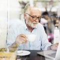 Senior Man Writing Working Coffee Shop Relaxation Concept Royalty Free Stock Photo