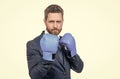 Senior manager stand in fighting position wearing boxing gloves in business formalwear, challenge Royalty Free Stock Photo