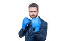 Senior manager stand in fighting position wearing boxing gloves in business formalwear, challenge Royalty Free Stock Photo