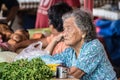 Senior market vendor in Kuching, Malaysian Borneo