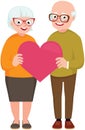 Senior married couple of lovers in full length hold the symbol of love heart