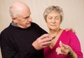 Senior mature couple taking pain medication Royalty Free Stock Photo