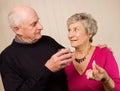 Senior mature couple taking pain medication Royalty Free Stock Photo