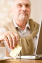 Senior mature man - home shopping with credit card Royalty Free Stock Photo