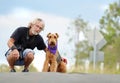 Senior mature man & pet dog on walk outdoors