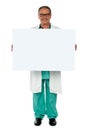 Senior medical professional displaying banner ad Royalty Free Stock Photo