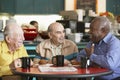 Senior men drinking tea together Royalty Free Stock Photo