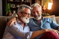 senior men gay male couple hugging sitting on the couch sofa, having a good time showing affection at home, LGBT LGBTQ marriage