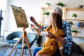 Senior man, grandfather and his grandchild drawing, painting together. Happy family time Royalty Free Stock Photo