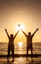 Senior Couple Holding Celebrating Sunset Tropical Beach Royalty Free Stock Photo