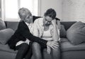 Mother and daughter crying at home in quarantine grieving loss of family members amid COVID-19 Royalty Free Stock Photo