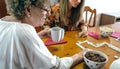 Senior mother and daughter playing domino Royalty Free Stock Photo