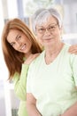 Senior mother and daughter smiling Royalty Free Stock Photo