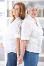 Senior mother and pregnant daughter smiling Royalty Free Stock Photo