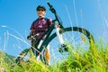 Senior With Mountain Bike Standing At Top Of A Hill Royalty Free Stock Photo