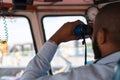 Senior Navigation Officer Navigating his Ship Royalty Free Stock Photo