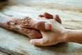 Senior old man Hands  and a child`s hand Royalty Free Stock Photo