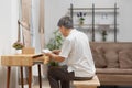 Senior old man reading documents that has forgotten in a drawer