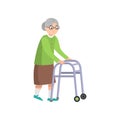 Senior old woman in green clothes walking with walker Royalty Free Stock Photo