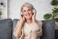 Senior old woman listening to her favourite music Royalty Free Stock Photo