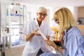 Optometrist examining patient in modern ophthalmology clinic