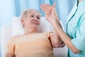 Senior with painful arm Royalty Free Stock Photo