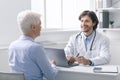 Senior patient at appointment of geriatrician doctor Royalty Free Stock Photo