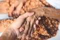 Senior patient and nurse - Pulse measurement by hand check the heart beat patient hand for a radial pulse by touching fingers - Royalty Free Stock Photo