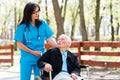 Senior Patient Talking With Kind Nurse