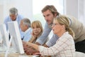 Senior people attending computing class Royalty Free Stock Photo