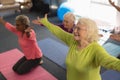 Senior people exercising in fitness studio Royalty Free Stock Photo