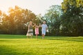 Senior people with granddaughter, nature. Royalty Free Stock Photo